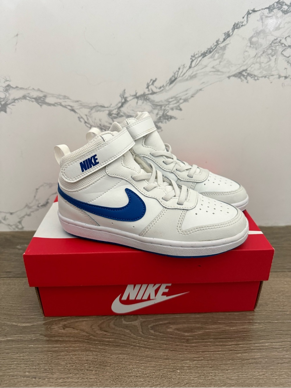 Nike Kids White High-Top Sneakers with Blue Swoosh
